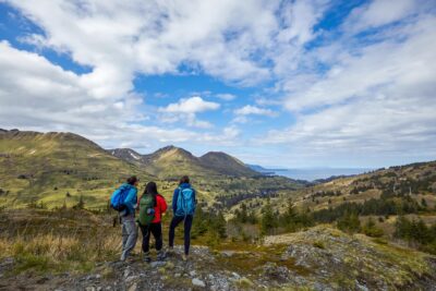 Hikers on top of mountain in Alaska